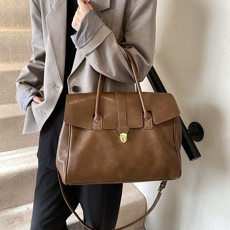 MOODS Branded Luxury Top-handl - Luxury Bags Consignment recension och pris
